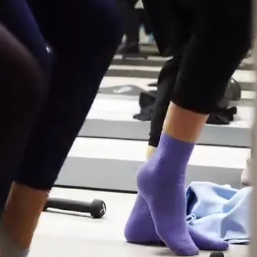 Trabajo de suelo sobre esterilla en clase de Pilates Mat